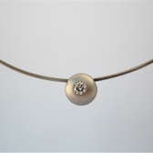 Niessing Schnur mit Kugel u. Brillant, Gold 750/- WG Brill. 0.19ct.