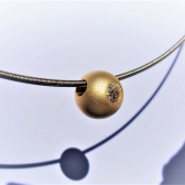 Niessing Schnur mit Kugel u. Brillant, Gold 750/- WG/GG Brill. 0.14ct.